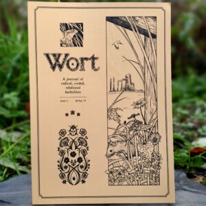 A photo of Wort issue three with yellow cover in a natural setting.